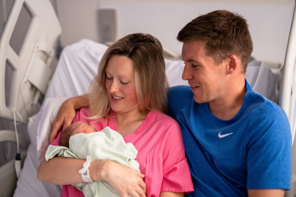 Parents with their newborn in Torbay Hospital's Maternity Unit