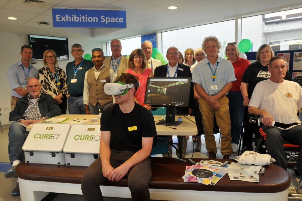 The Pain Management team with former patients, and the Torbay Hospital League of Friends at the summer showcase event.